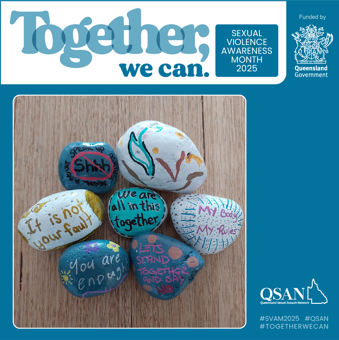 7 painted river rocks on a wooden surface, each rock has a different message painted including It is not your fault, We are all in this together, You are enough
